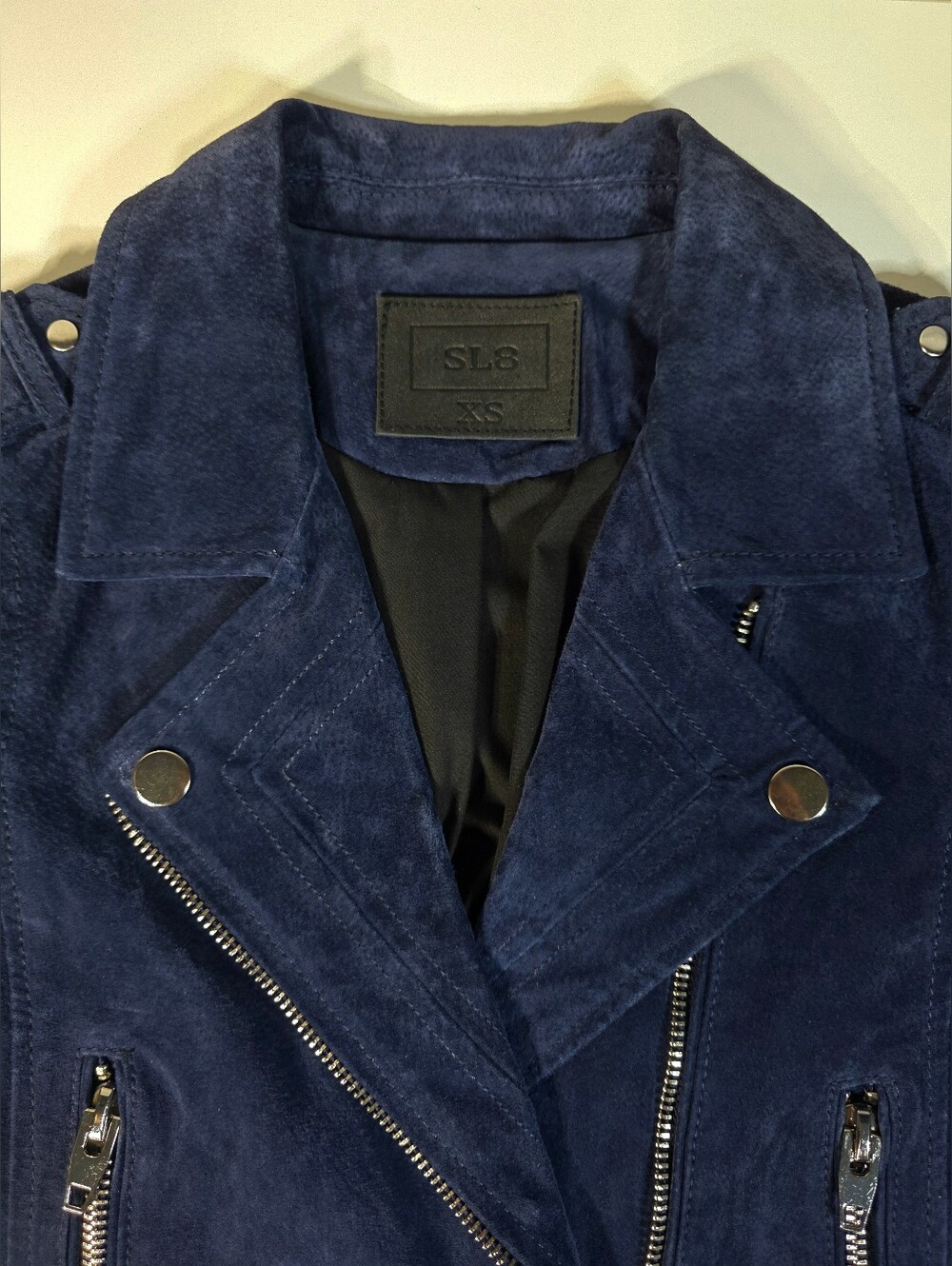 BLANKNYC "SL8" Women’s Suede Moto Jacket in a navy/royal blue colorway. Size XS